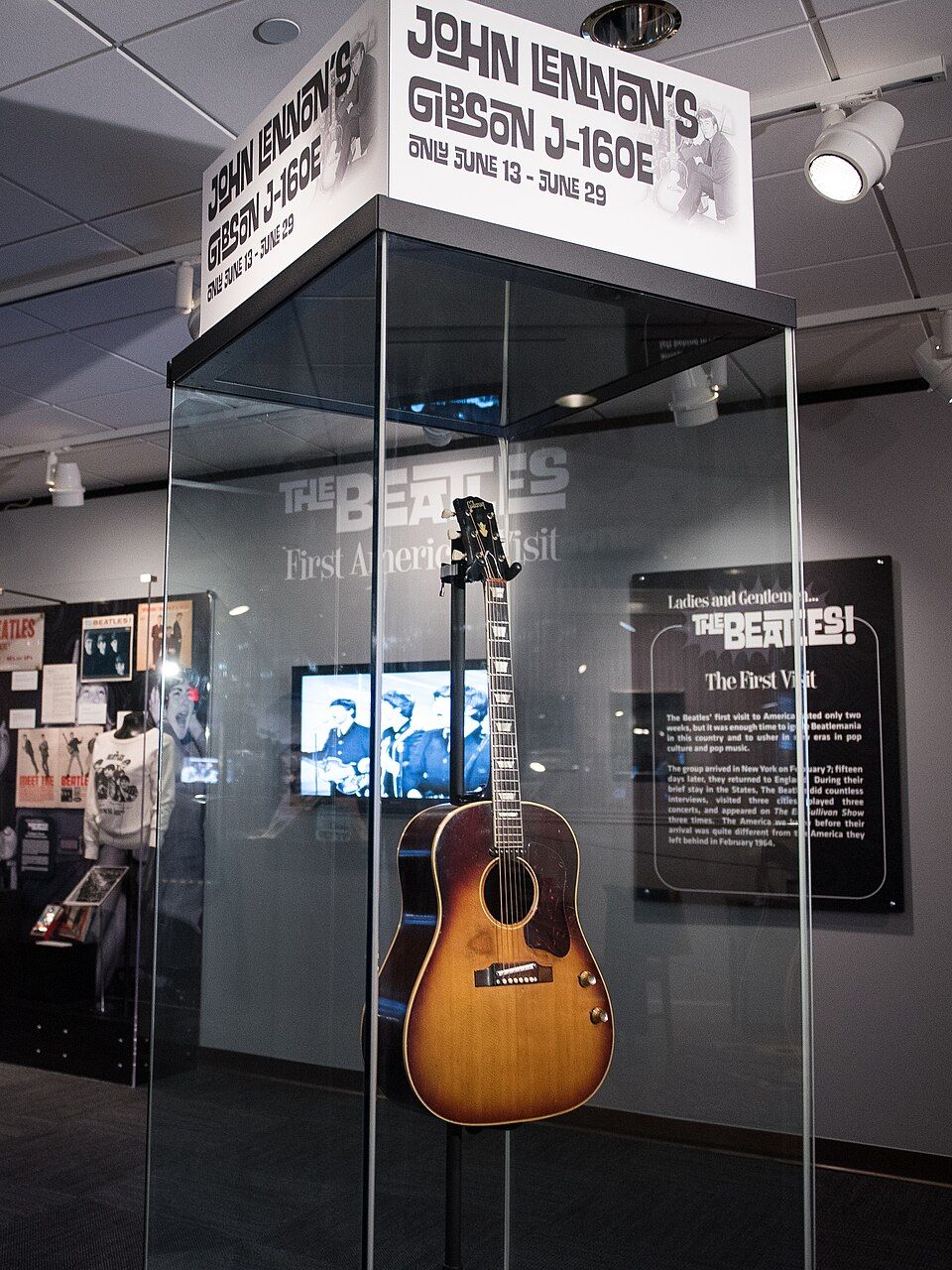 John_Lennon's_missing_1962_Gibson_J-160E_guitar_in_the_exhibit_(clip1)_-__Ladies_and_Gentlemen..._the_Beatles!__exhibit_at_LBJ_Presidential_Library,_Austin,_TX,_2015-06-10_10.42.09.jpg